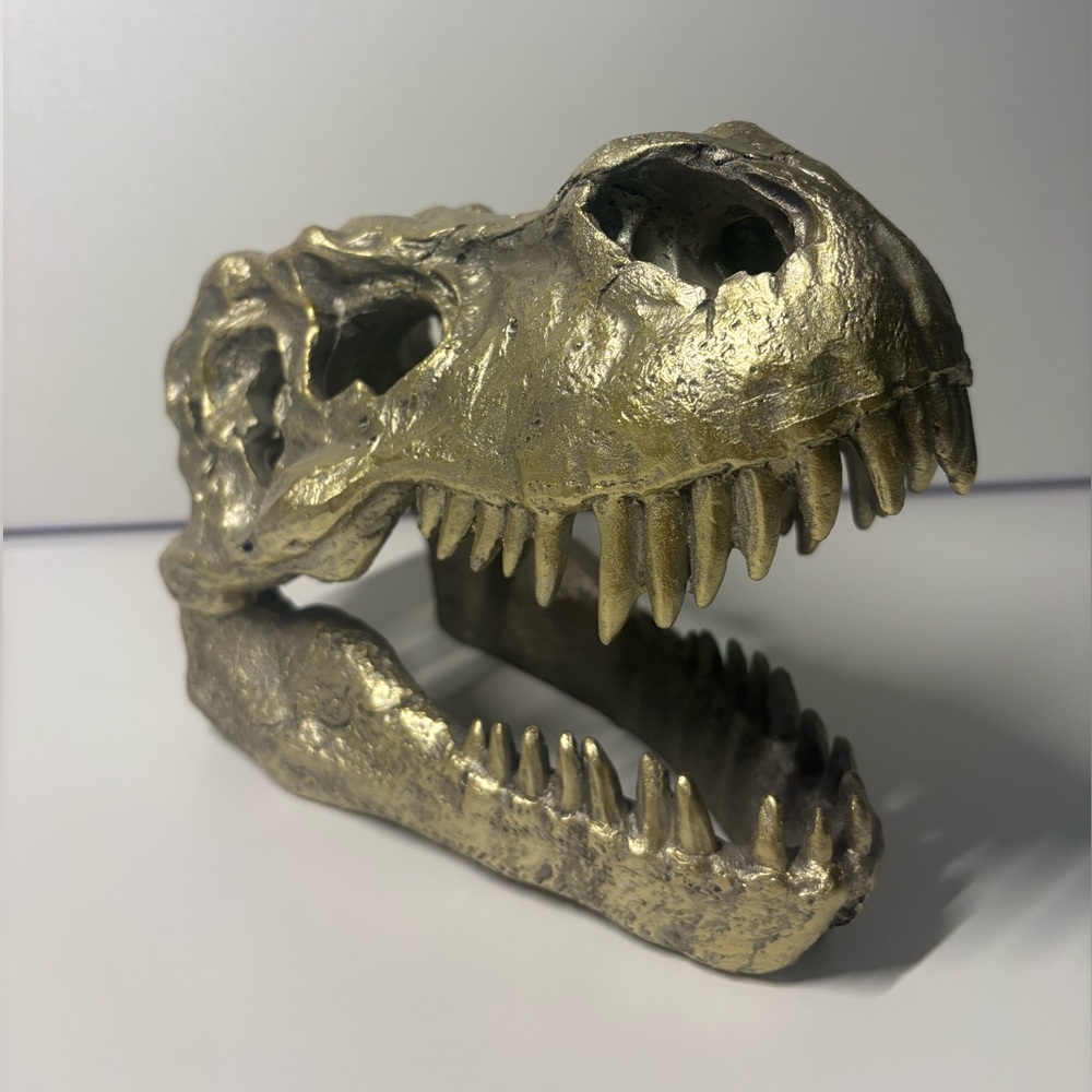 Gold T-Rex skull decor
